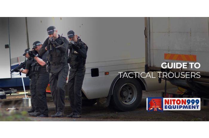 4 police officers in black uniform with guns raised