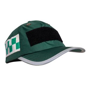 The image shows an EMS (Ambulance) Hi-Vis Safety Bump Cap in Paramedic Green, featuring a polycarbonate inner shell and high-density foam pads for impact protection. The cap has reflective piping on the front peak and green and white chequered reflective 