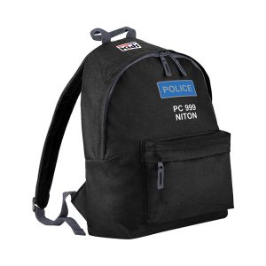 A durable black 'Police Kids Backpack' designed for children, with a vivid blue and white police patch prominently displayed on the top front. The patch reads 'POLICE' in bold white lettering with 'PC 999 NITON' underneath, mimicking UK police uniform ins