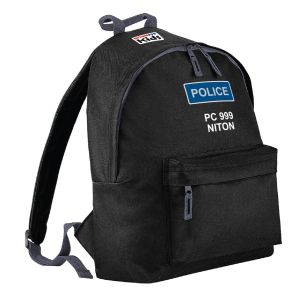 A durable black 'Police Kids Backpack' designed for children, with a vivid blue and white police patch prominently displayed on the top front. The patch reads 'POLICE' in bold white lettering with 'PC 999 NITON' underneath, mimicking UK police uniform ins