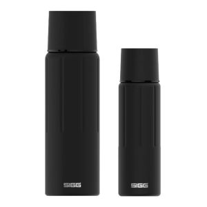 Sigg Thermo Flask Gemstone IBT Black in two sizes, with the larger 1.1L flask standing tall and the smaller 0.5L flask beside it. Both feature sleek, matte black finishes with embossed vertical lines for enhanced grip and stability, the SIGG logo prominen