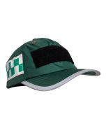 The image shows an EMS (Ambulance) Hi-Vis Safety Bump Cap in Paramedic Green, featuring a polycarbonate inner shell and high-density foam pads for impact protection. The cap has reflective piping on the front peak and green and white chequered reflective 